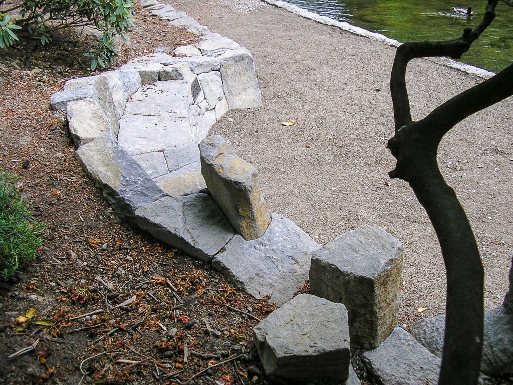 Eric Contey Stonework – Memorial viewing bench at the Rhododendron Gardens, Portland, OR